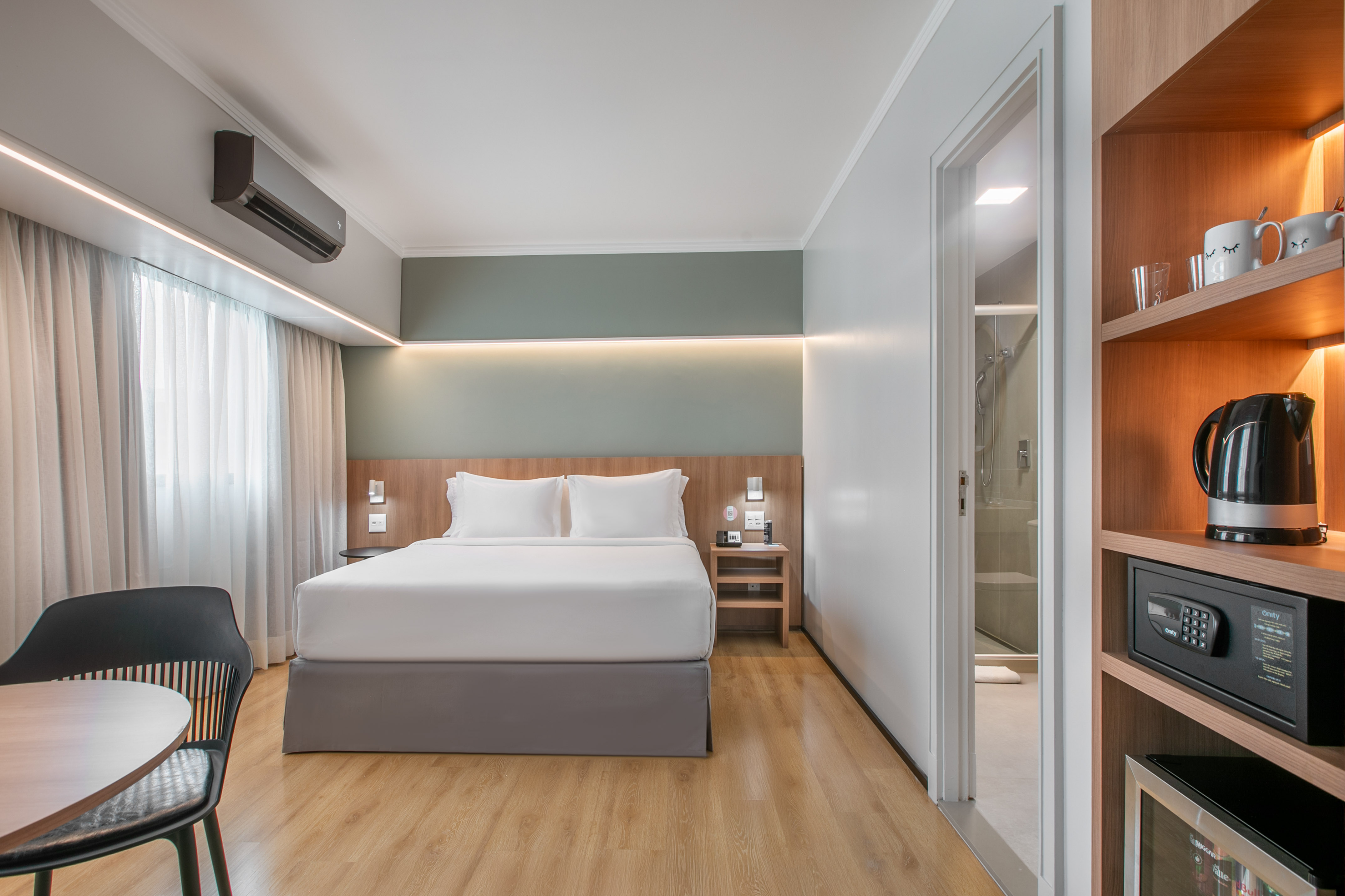 a room with a bed and a chair