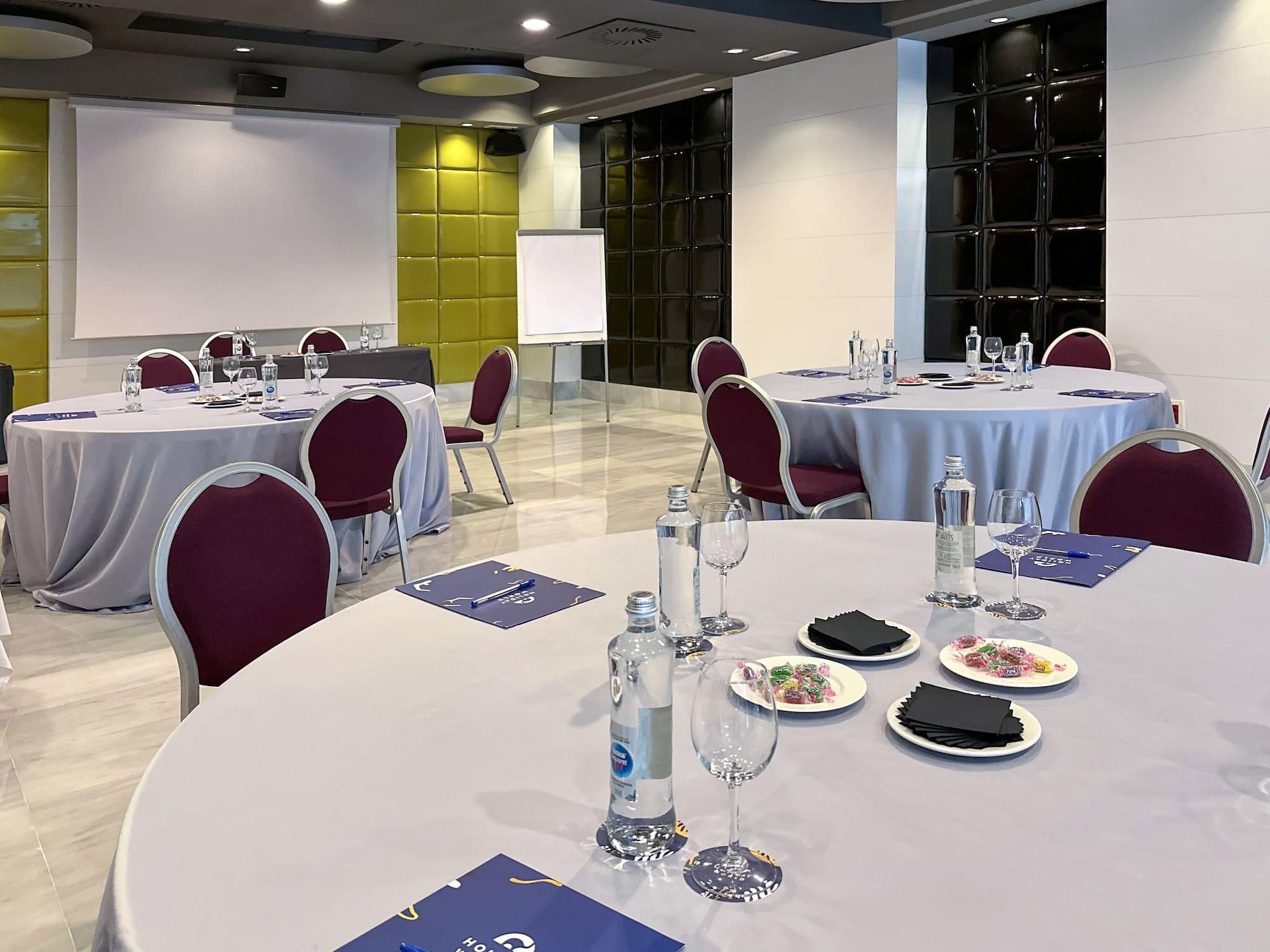 a room with tables and chairs