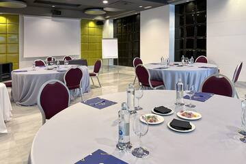 a room with tables and chairs