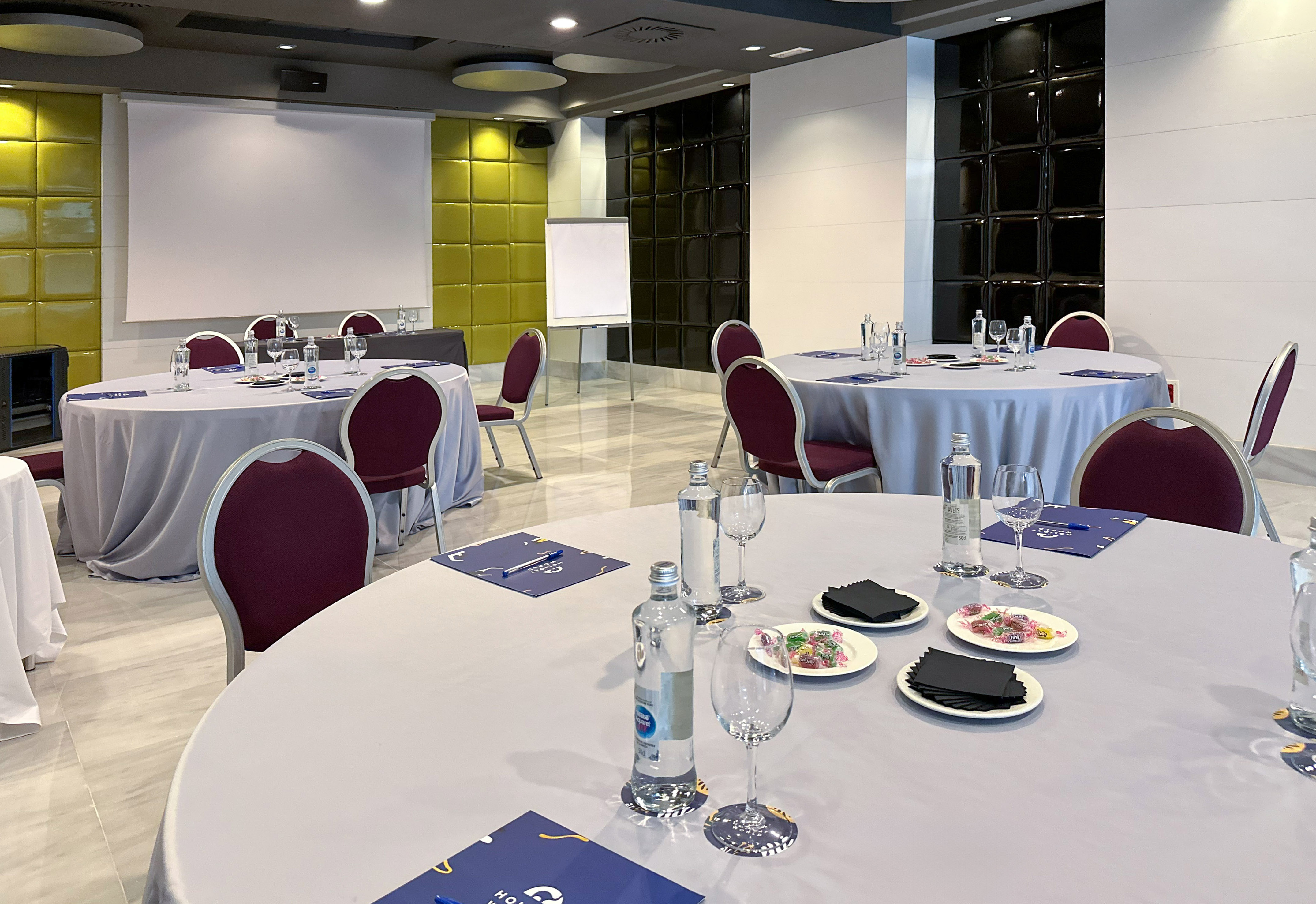 a room with tables and chairs