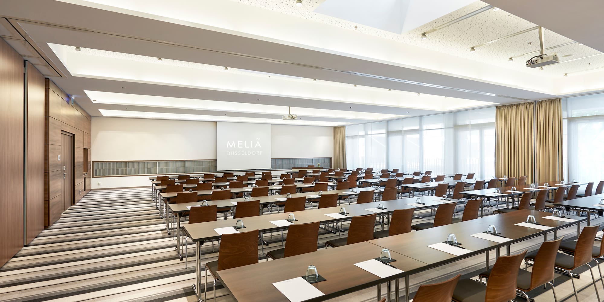 a room with tables and chairs