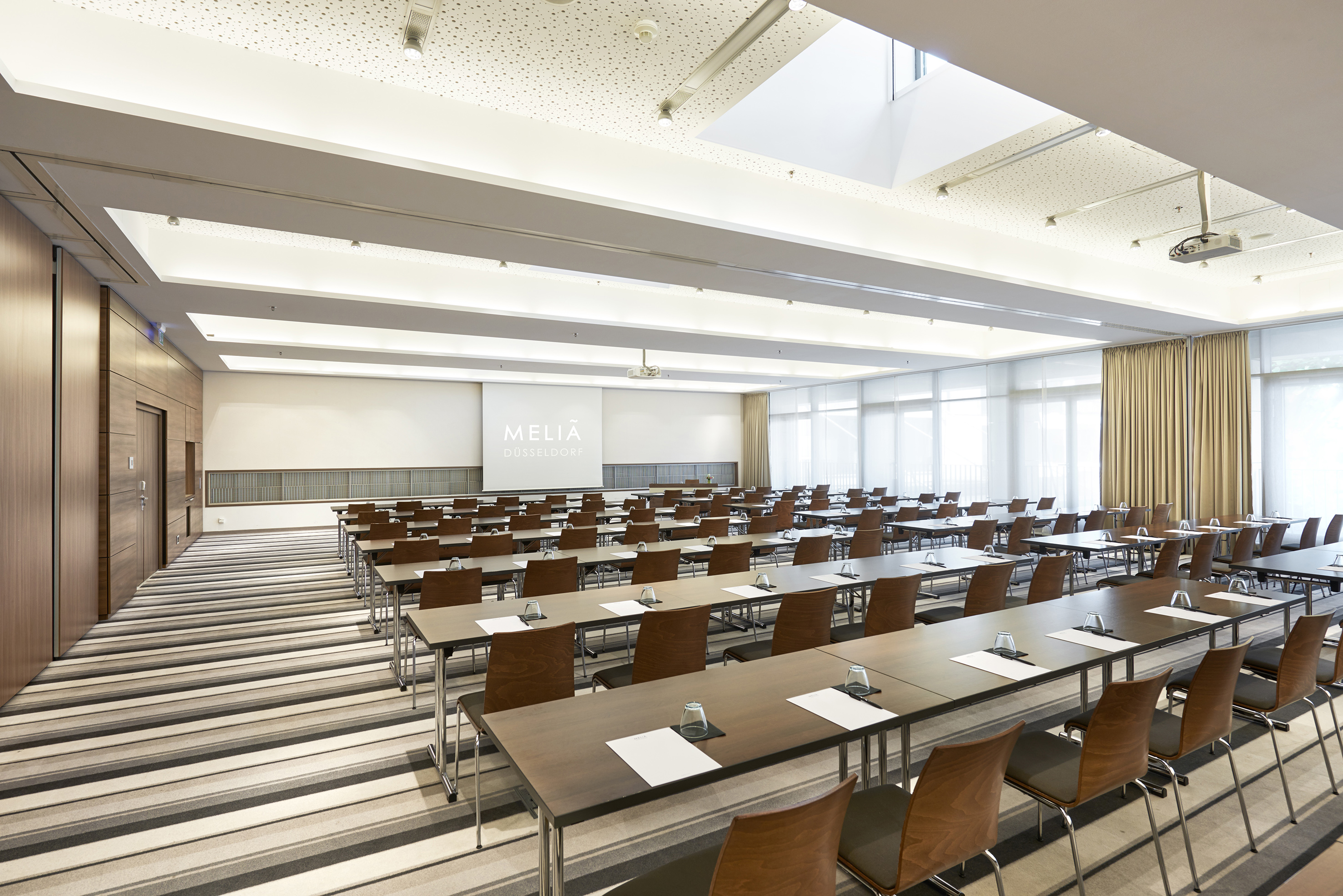 a room with tables and chairs