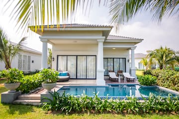 a pool in front of a house
