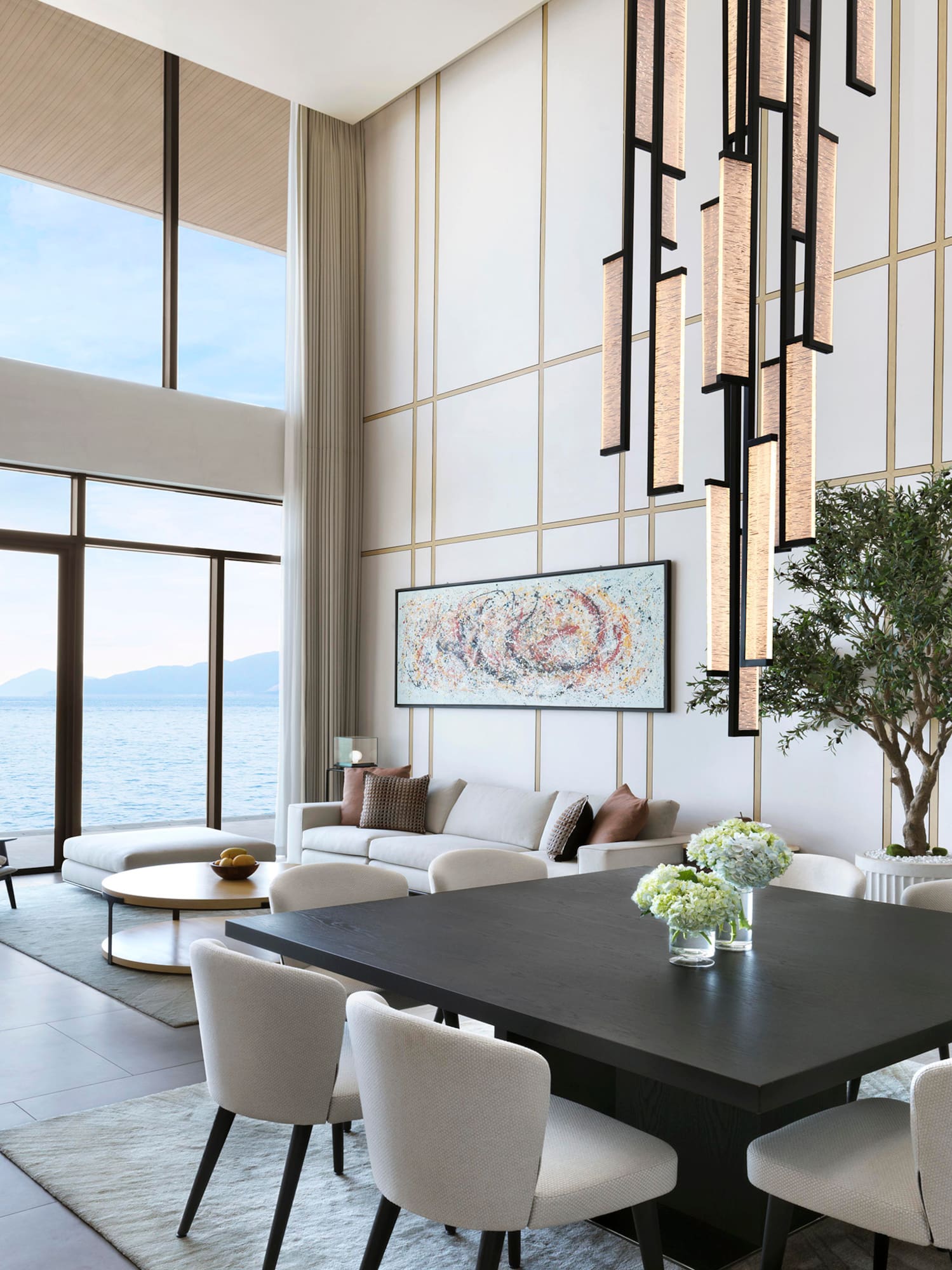 a room with a large table and chairs