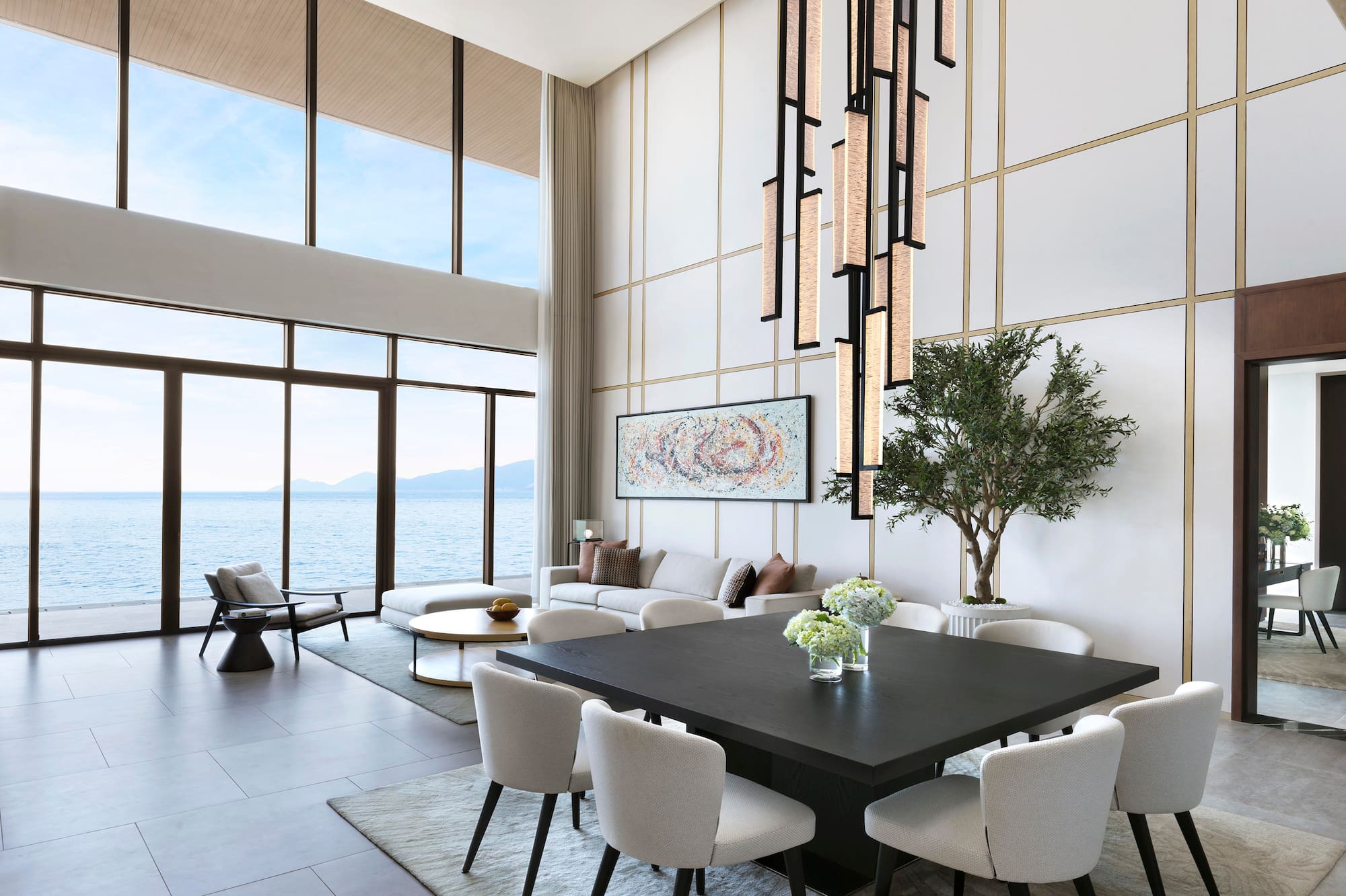 a room with a large table and chairs