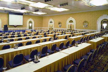 a room with tables and chairs