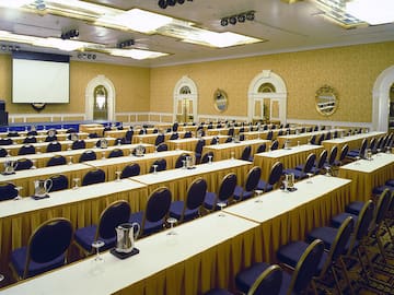 a room with tables and chairs