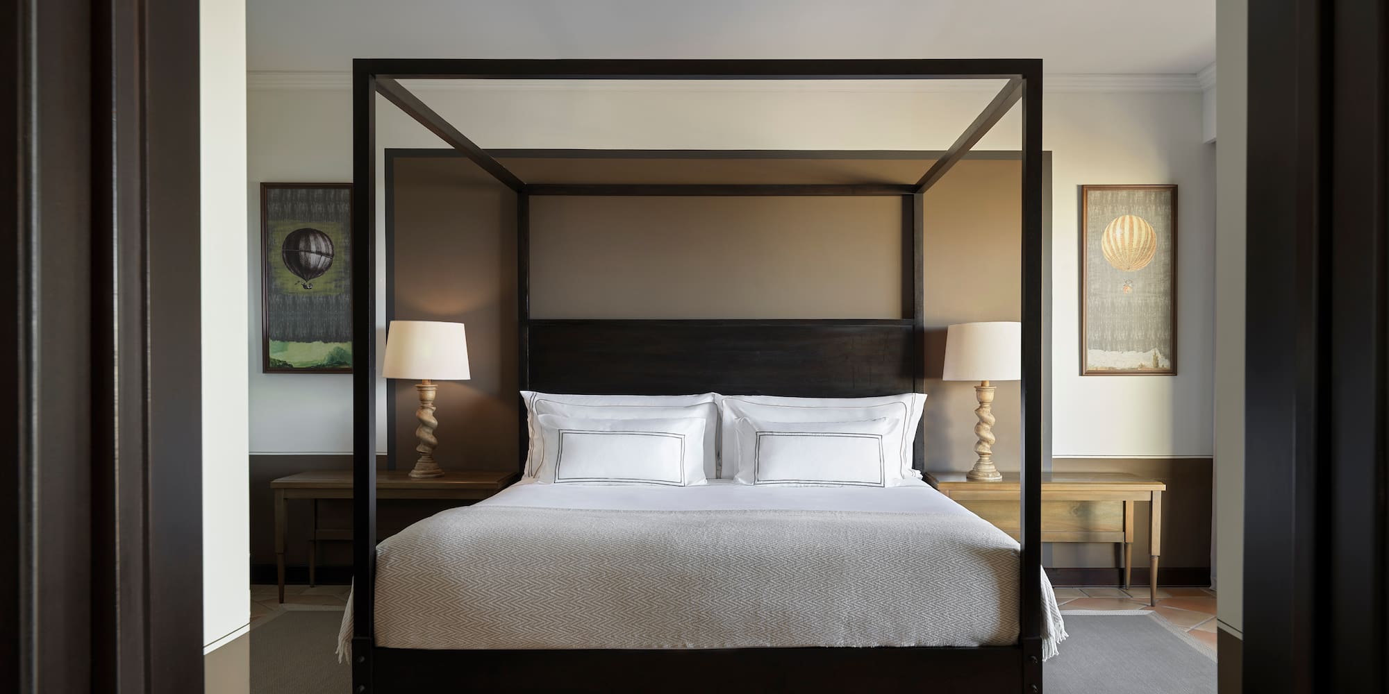 a bed with a canopy in a room