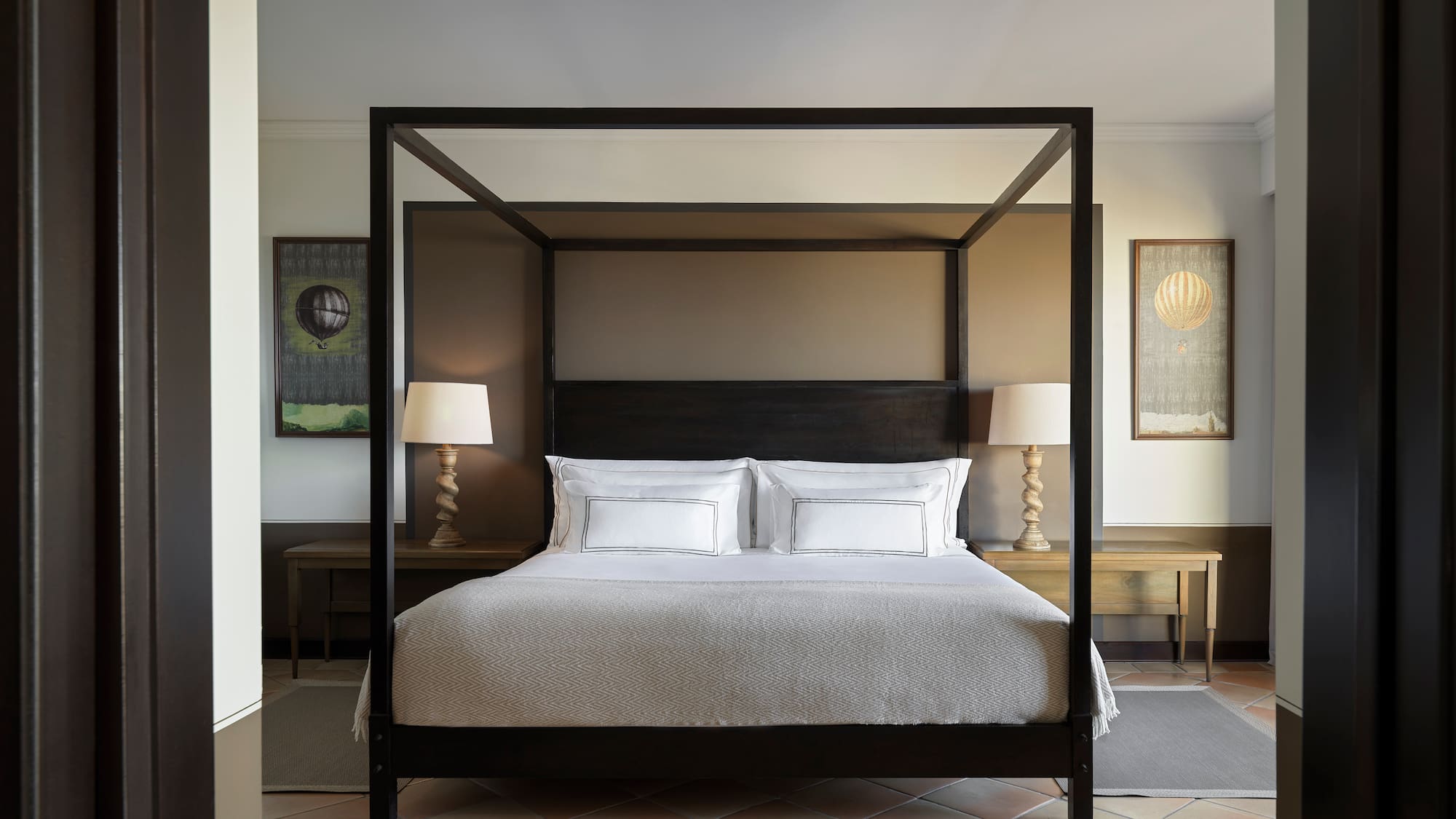 a bed with a canopy in a room