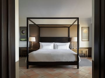 a bed with a canopy in a room