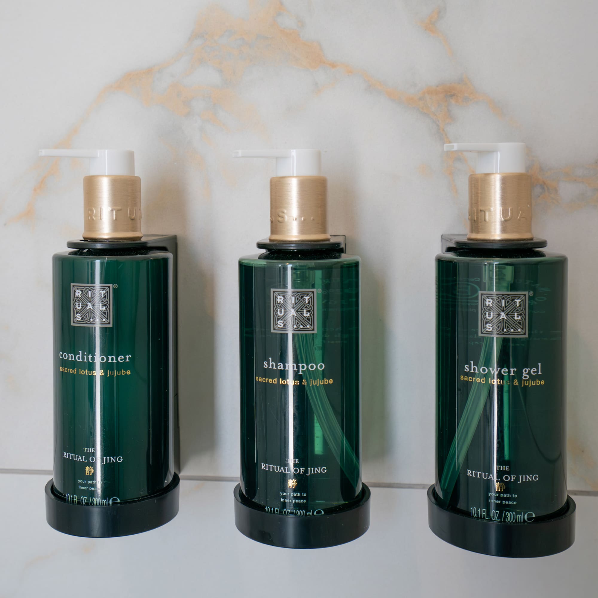 a group of green bottles with white caps