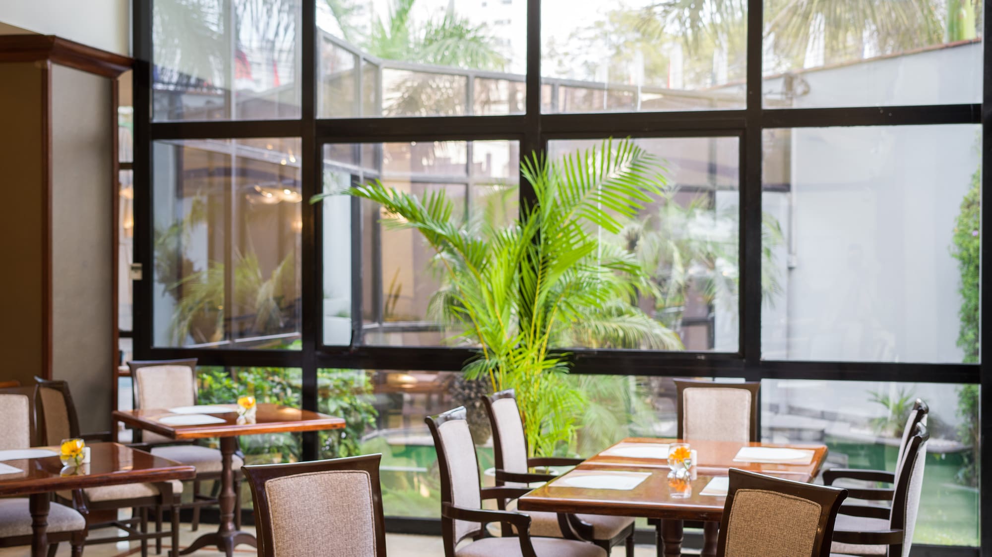 a room with tables and chairs