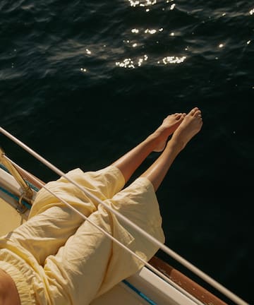a person's legs on a boat