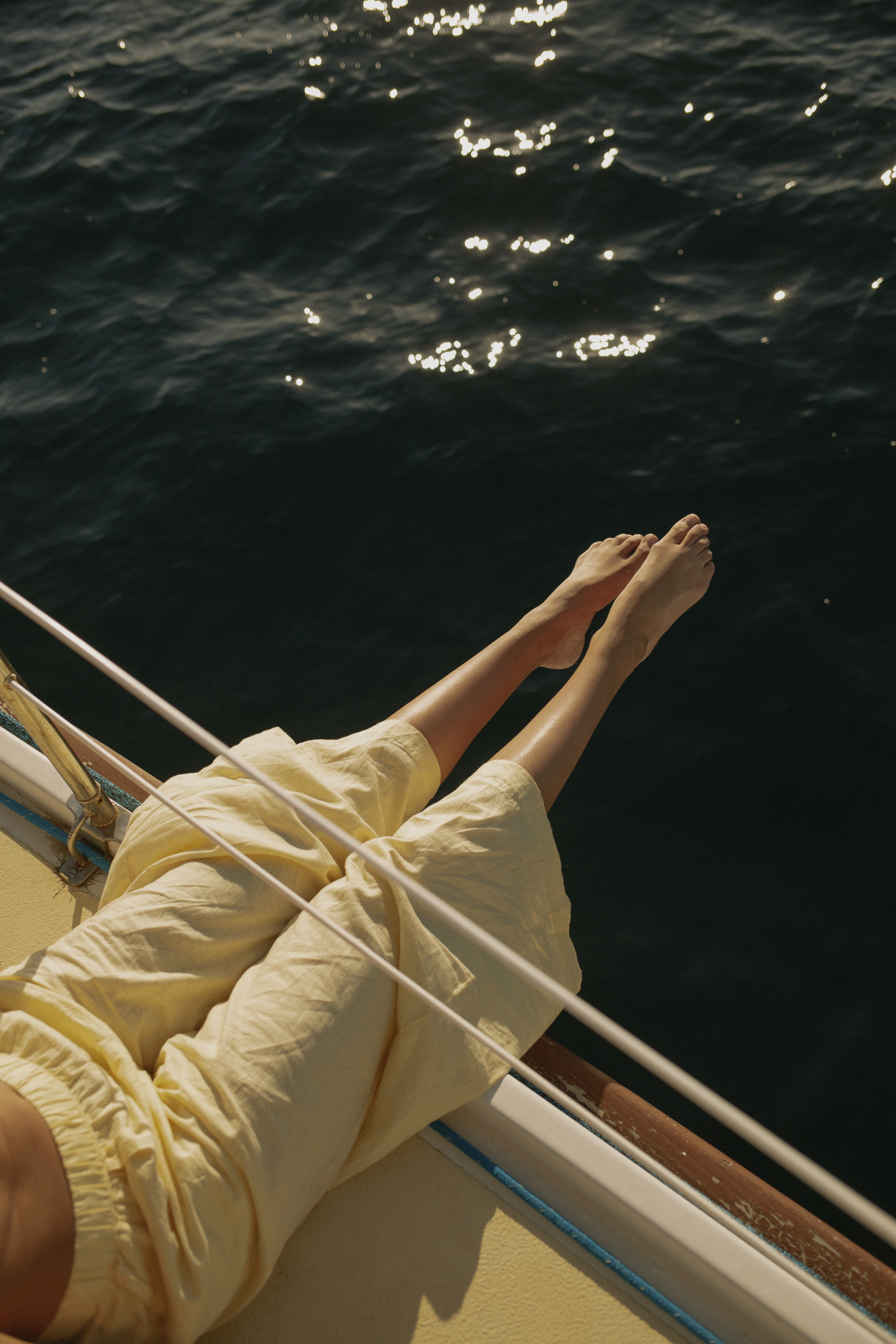 a person's legs on a boat