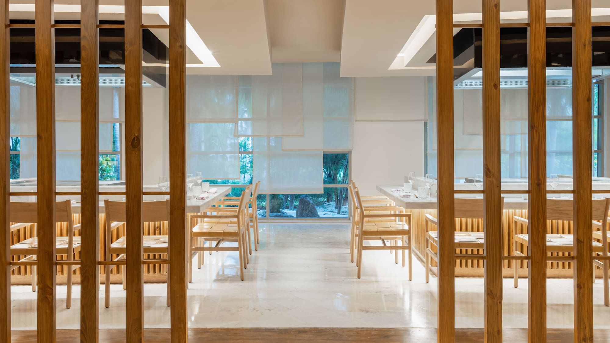 a room with tables and chairs