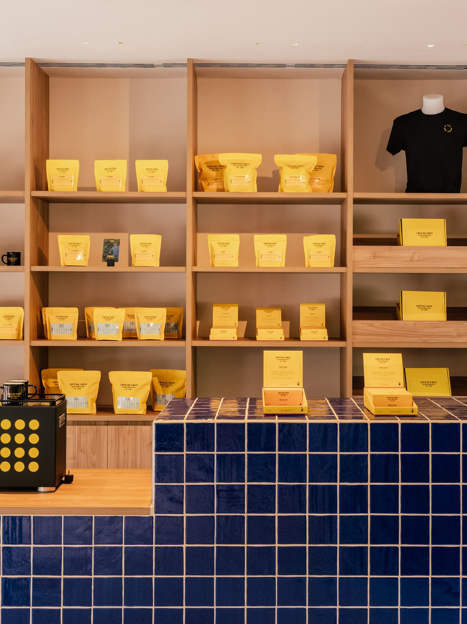 a shelf with yellow boxes on it