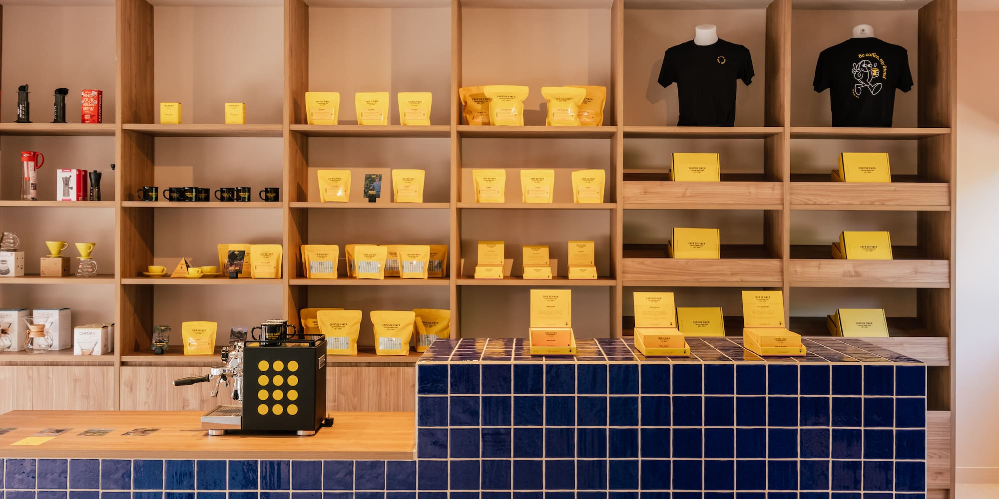 a shelf with yellow boxes on it