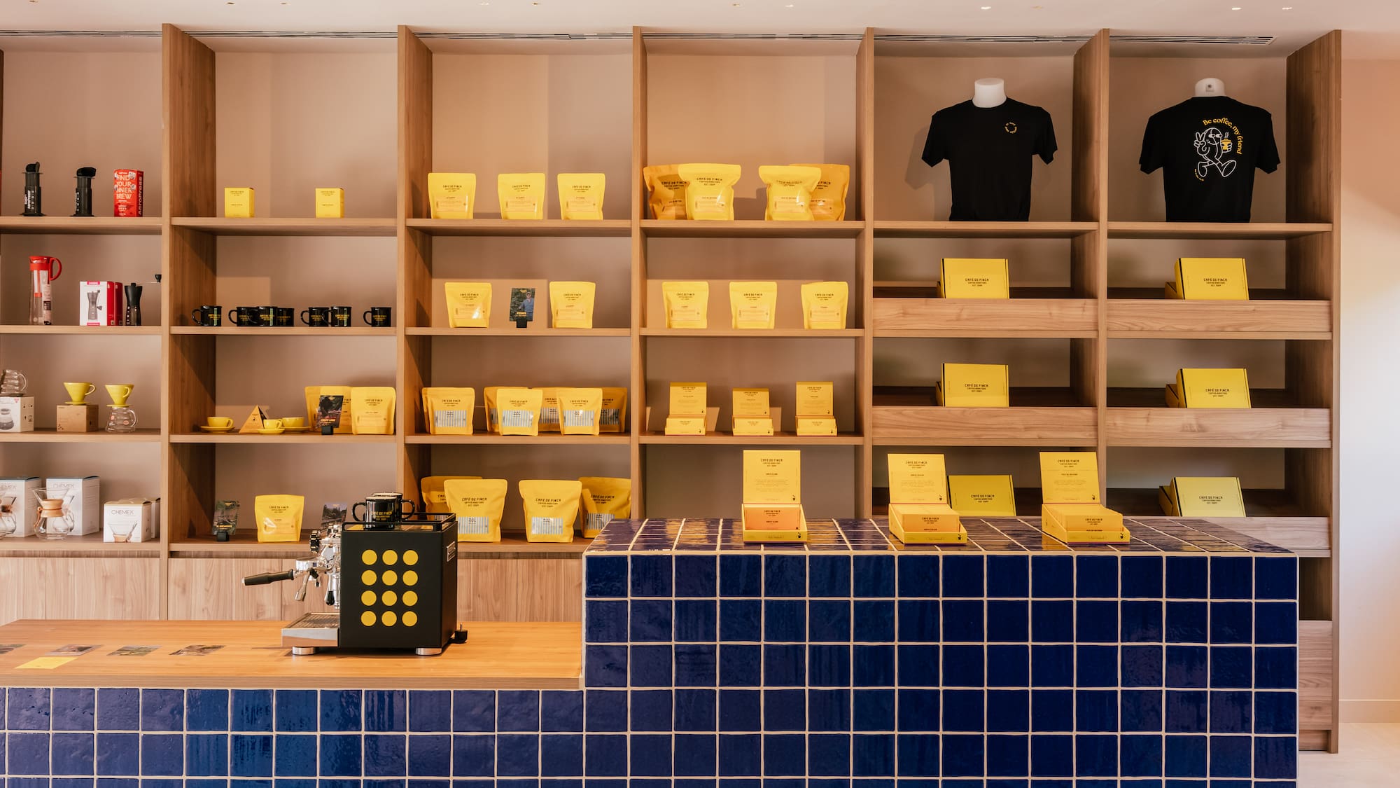 a shelf with yellow boxes on it