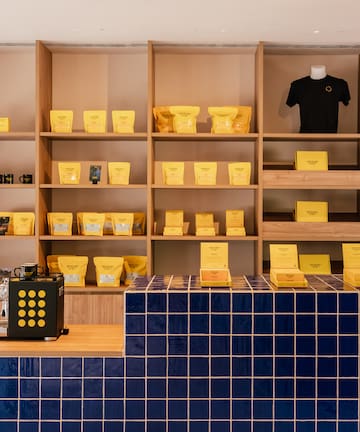 a shelf with yellow boxes on it