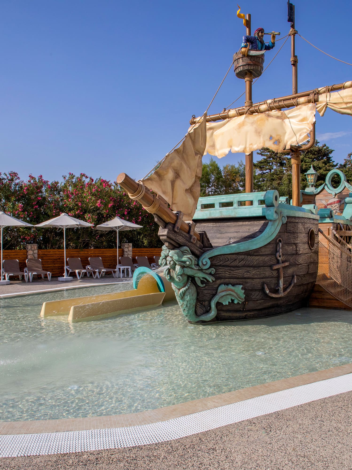 a water slide in a pool