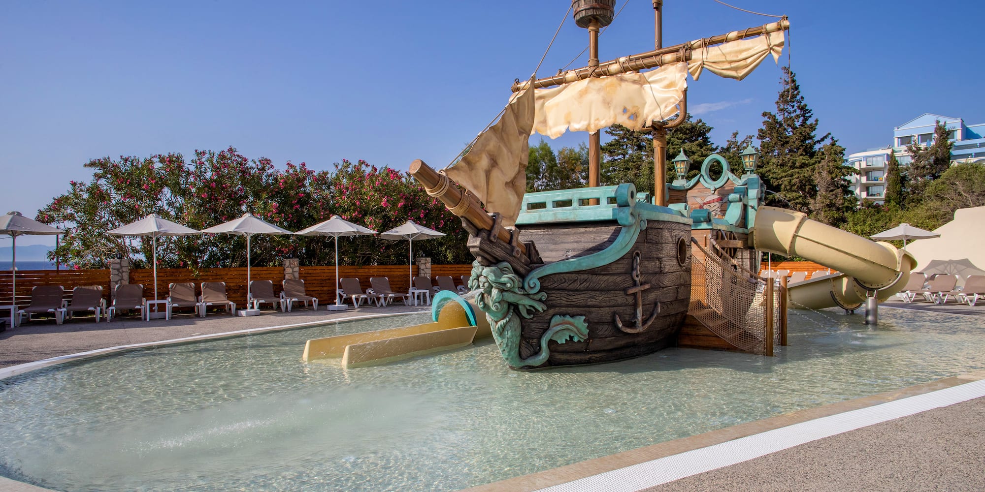 a water slide in a pool