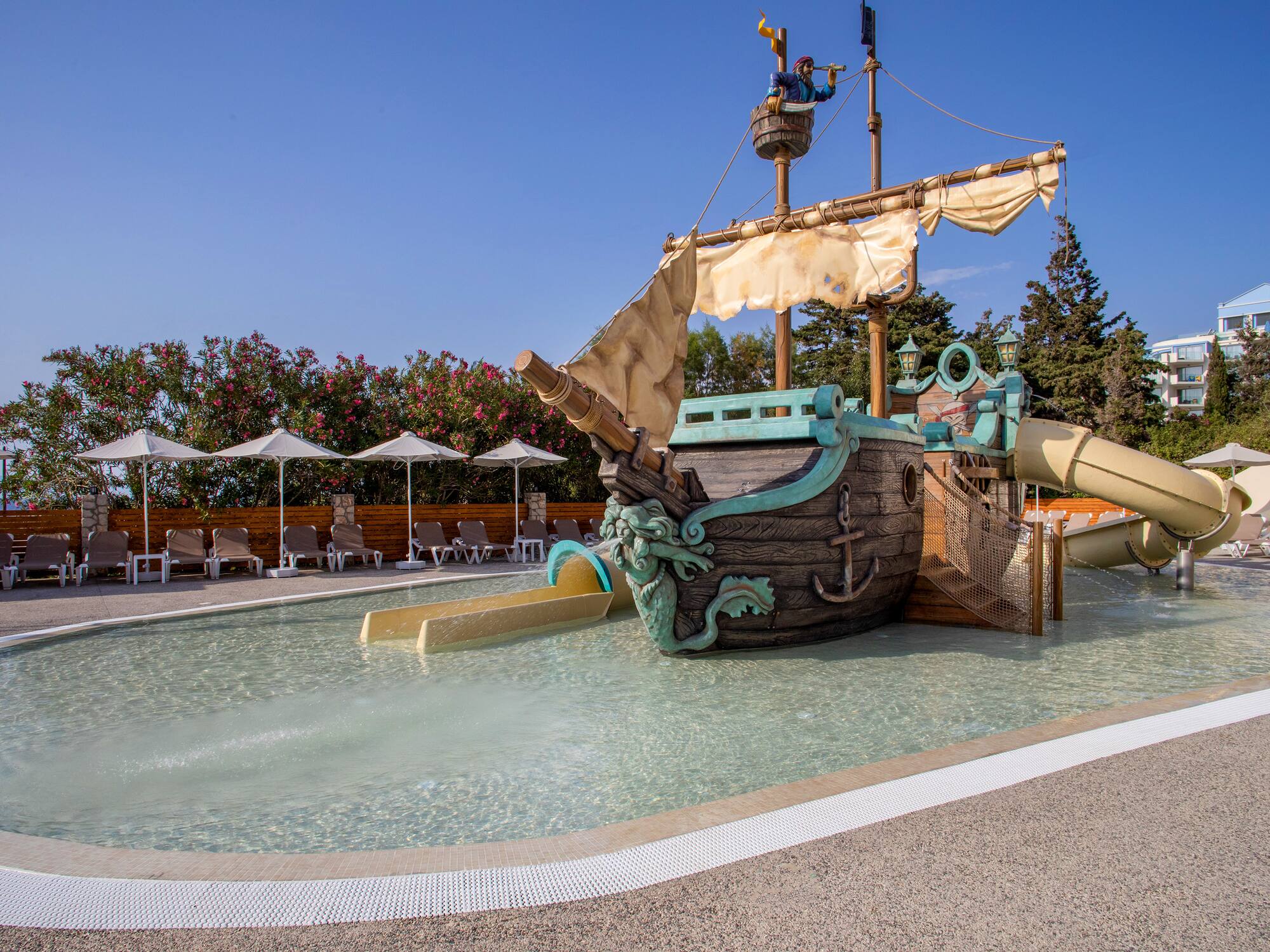 a water slide in a pool