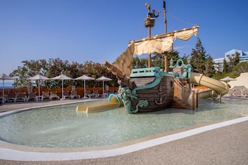 a water slide in a pool