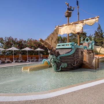 a water slide in a pool
