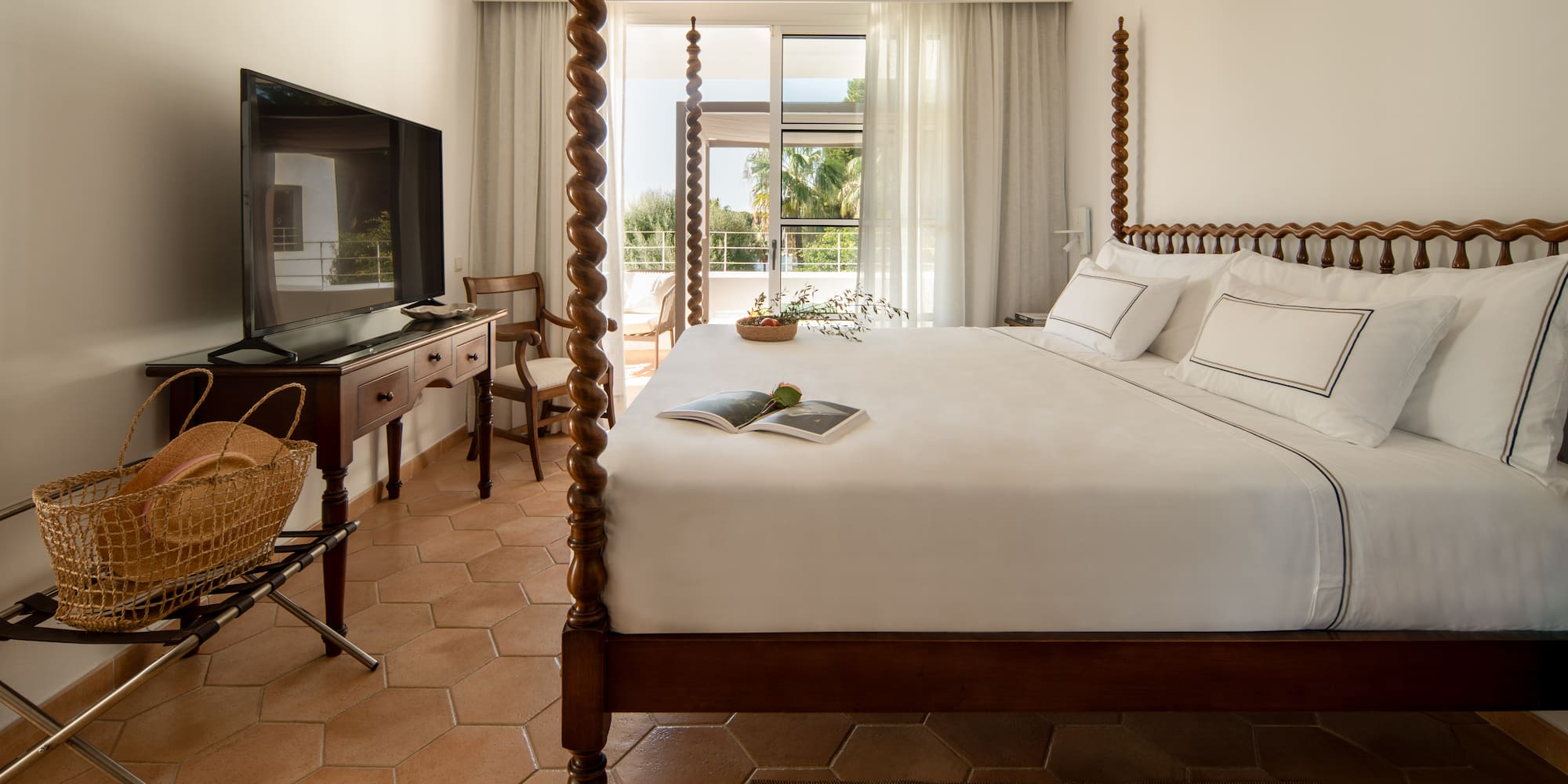 a bed with a television in a room