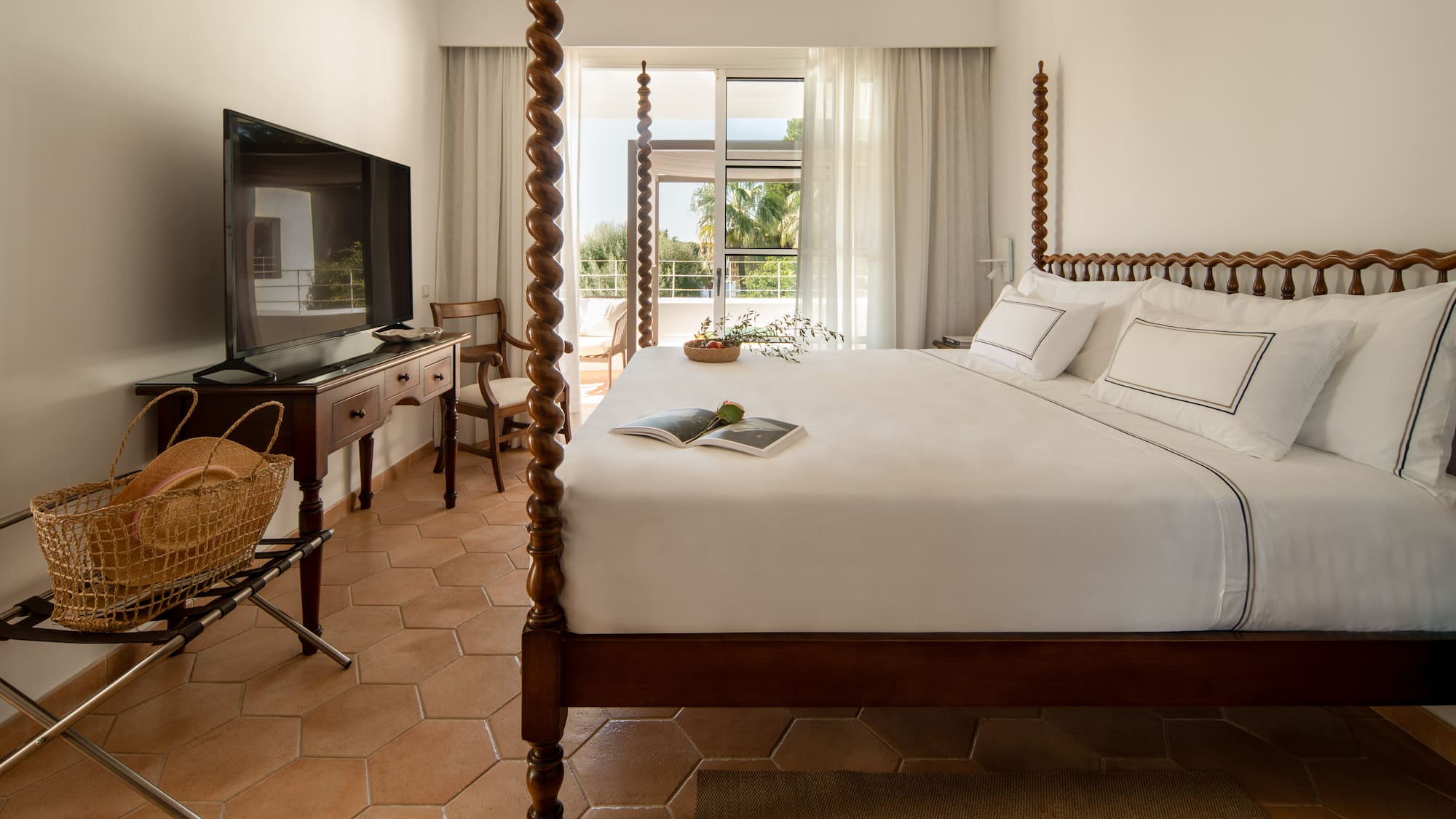 a bed with a television in a room