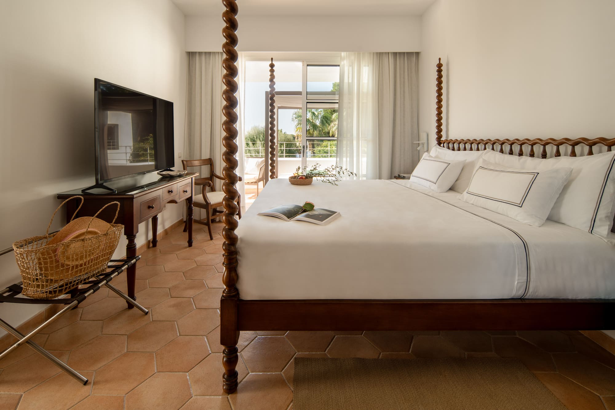 a bed with a television in a room