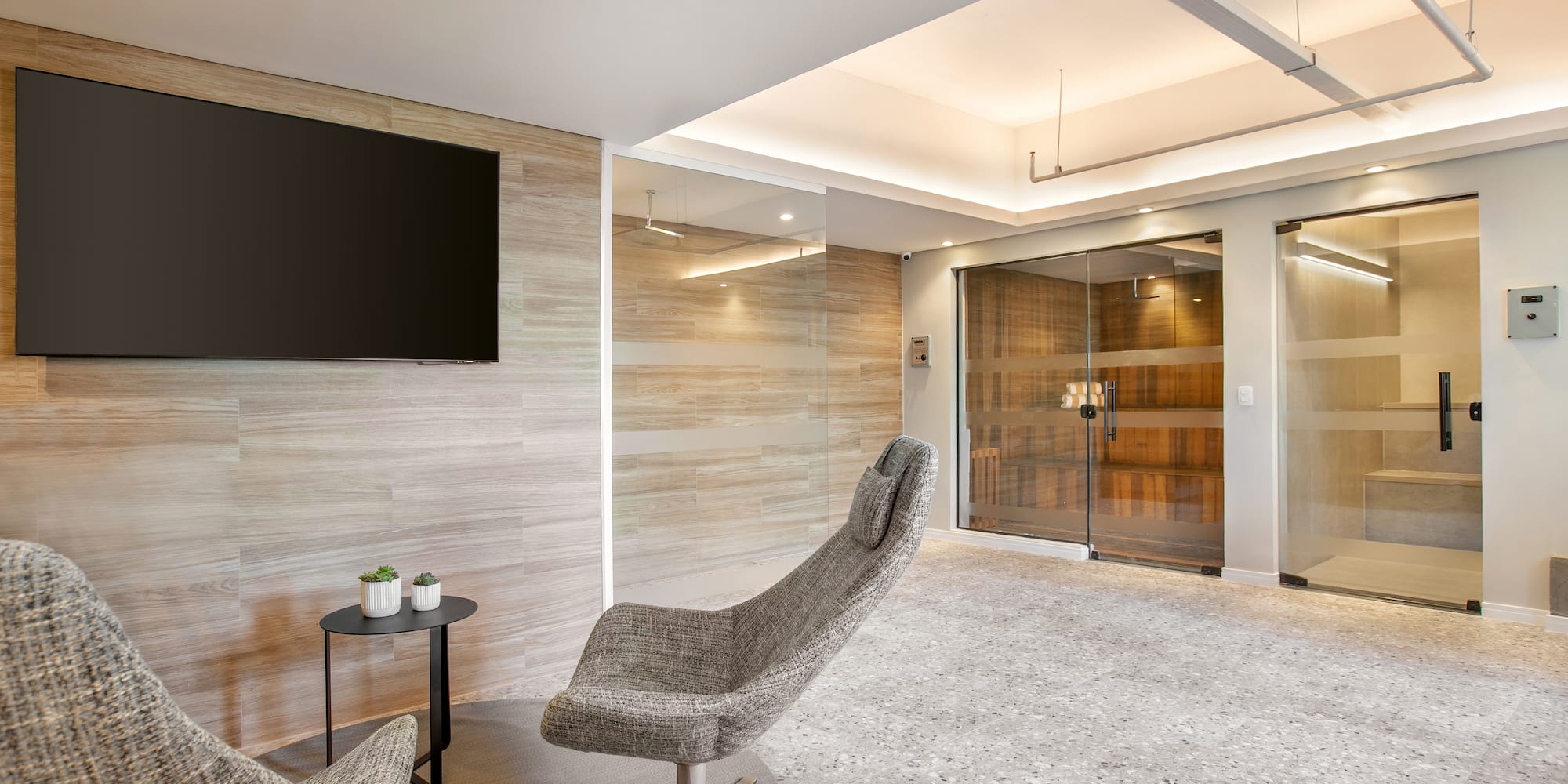 a room with a television and a chair