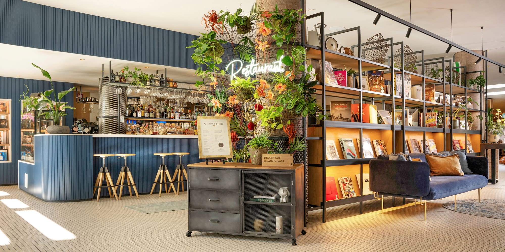 a restaurant with shelves and a bar