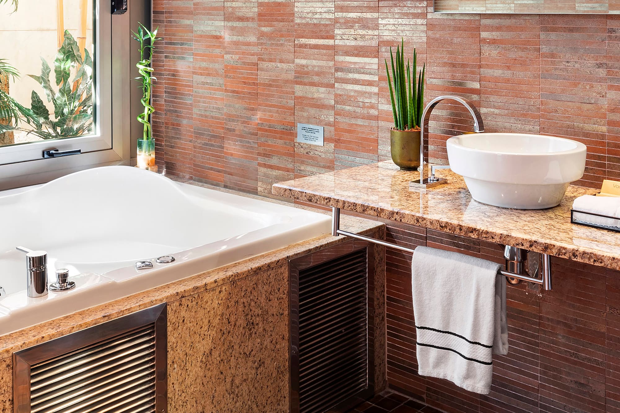 a bathroom with a sink and a bathtub