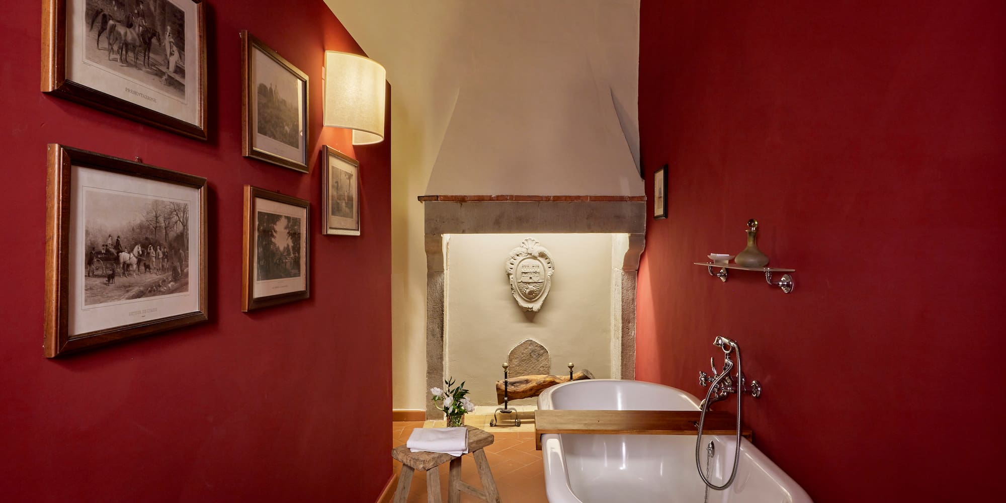 a bathroom with a tub and a stool