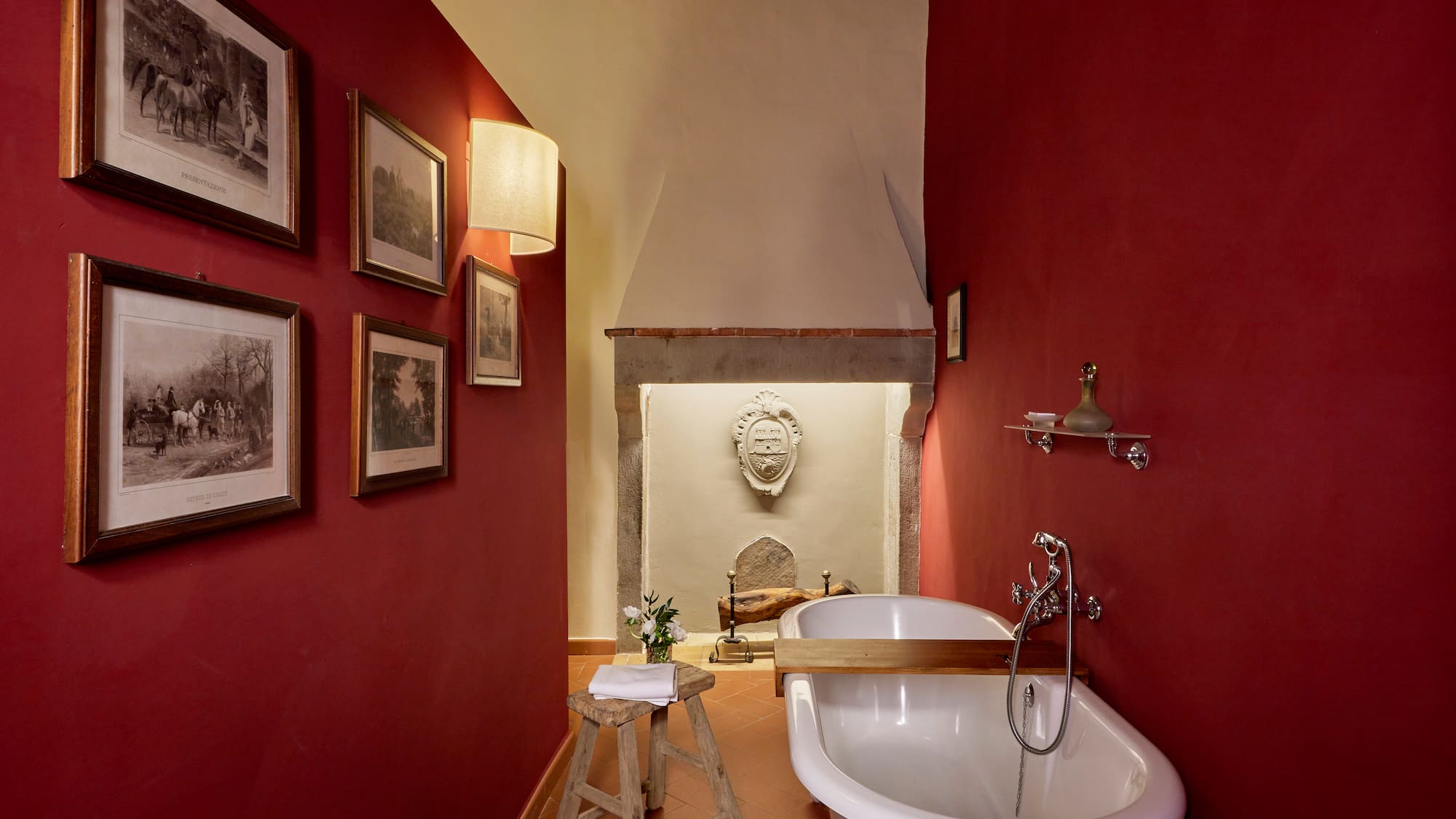 a bathroom with a tub and a stool