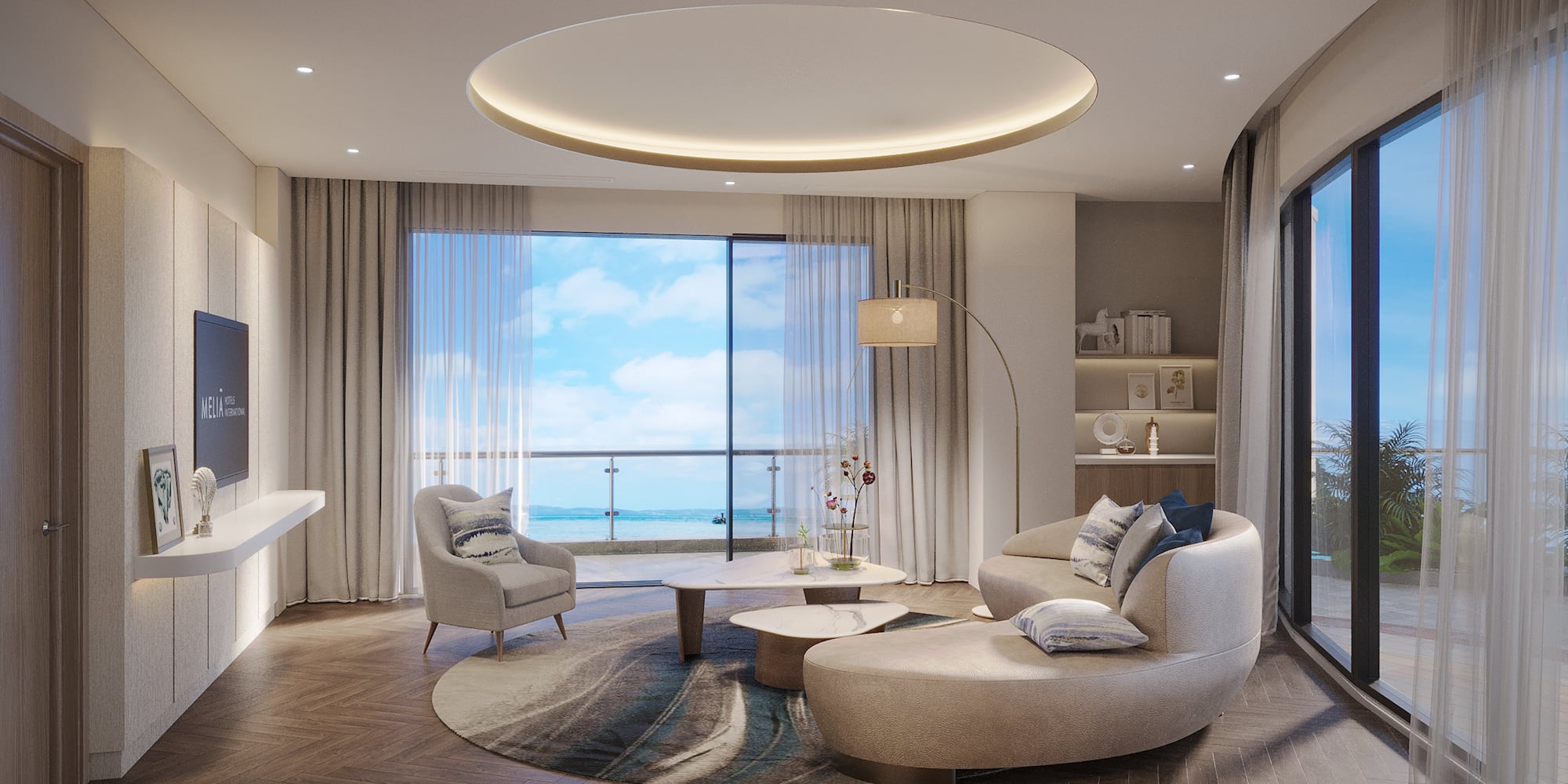 a living room with a large window and a large couch