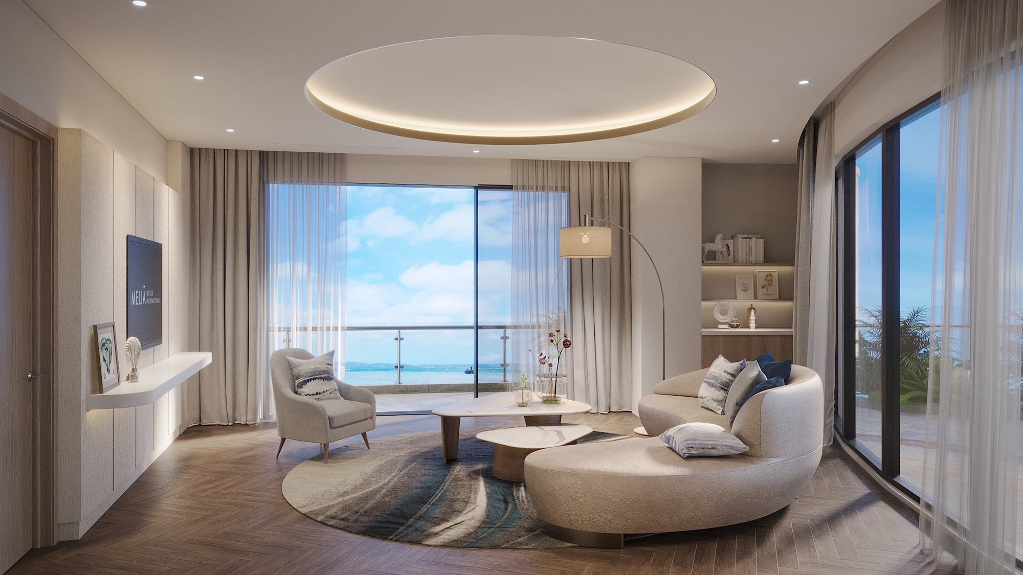 a living room with a large window and a large couch