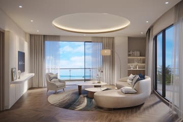 a living room with a large window and a large couch