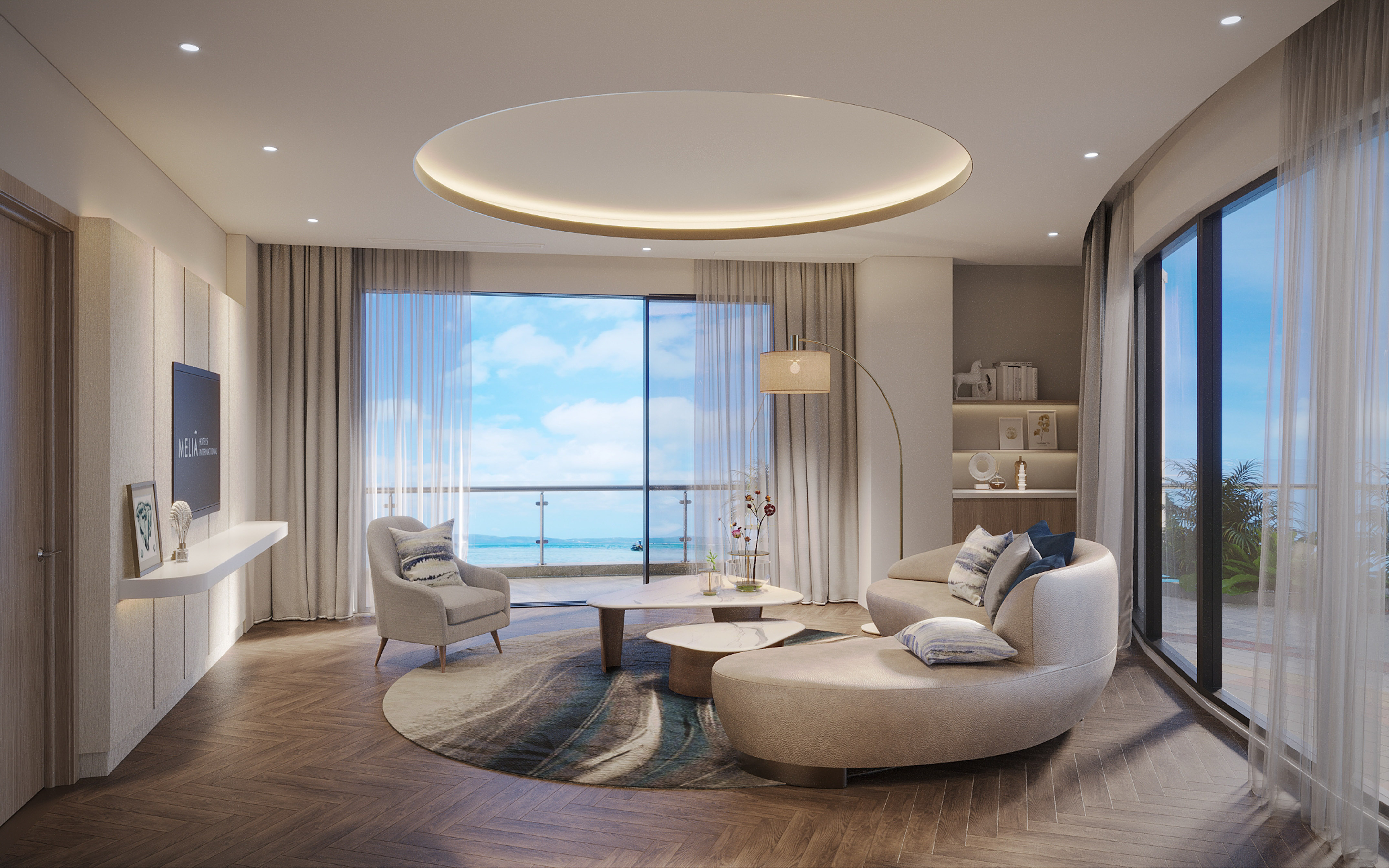 a living room with a round table and couches