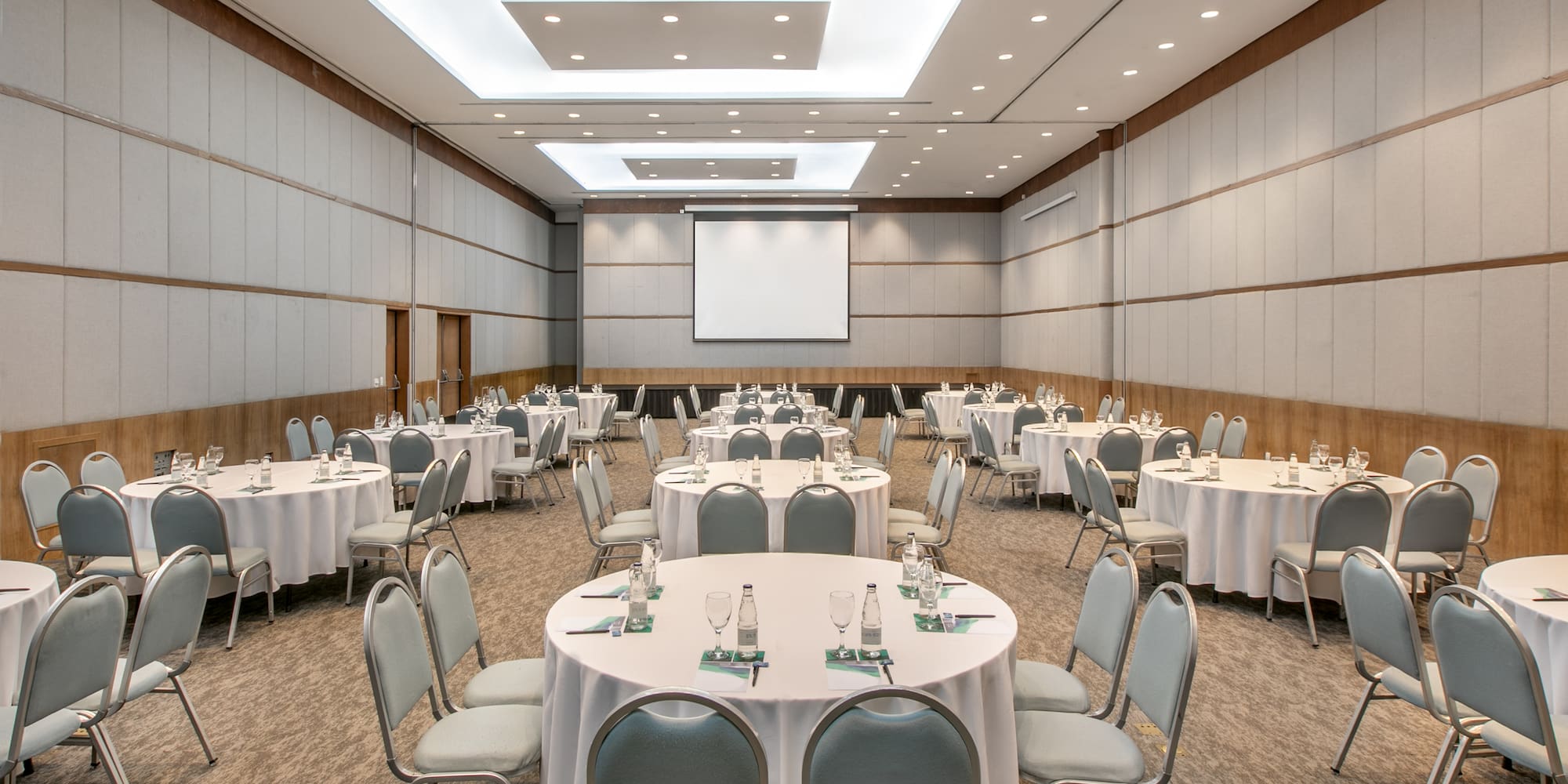 a room with tables and chairs