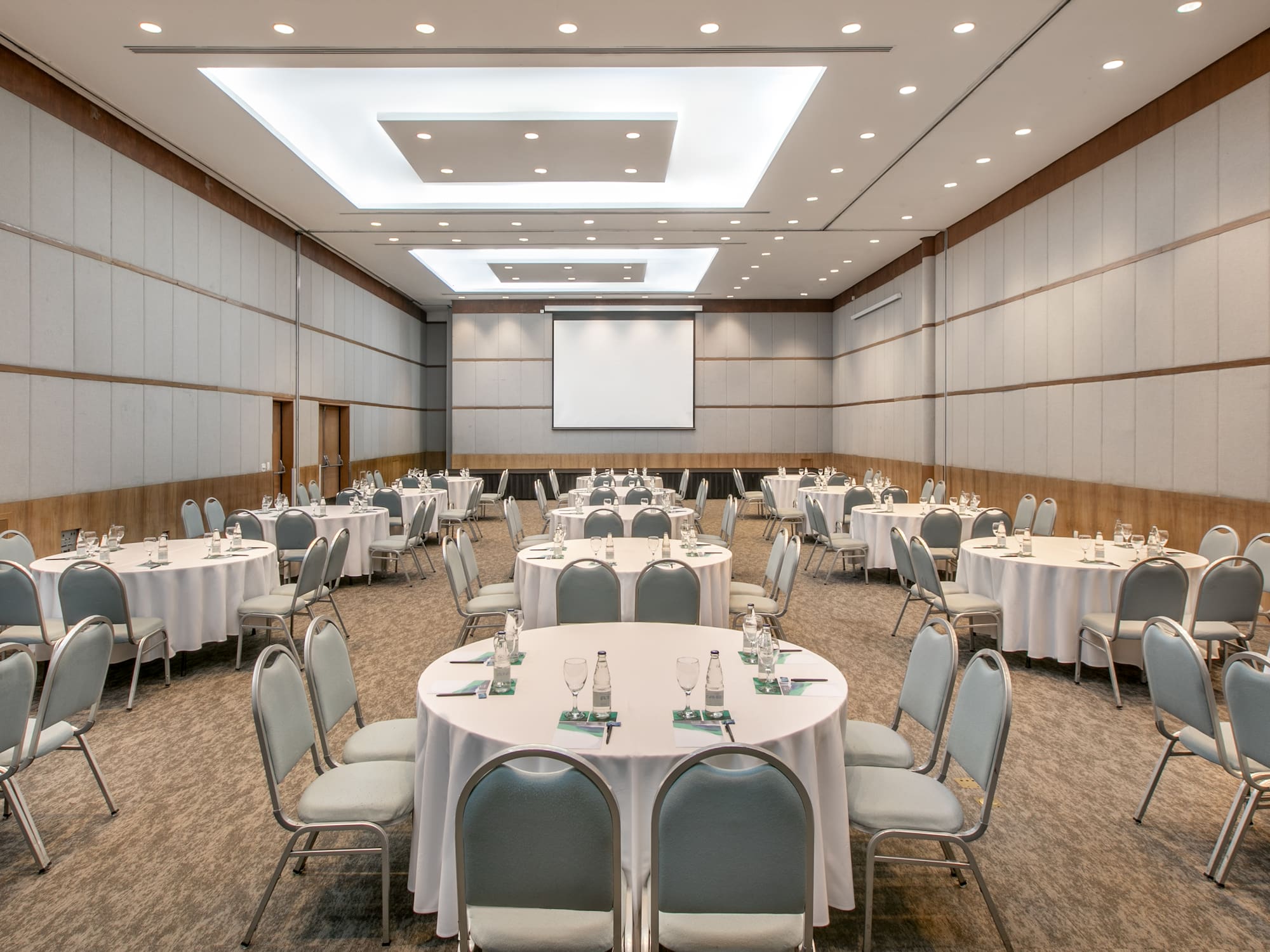 a room with tables and chairs