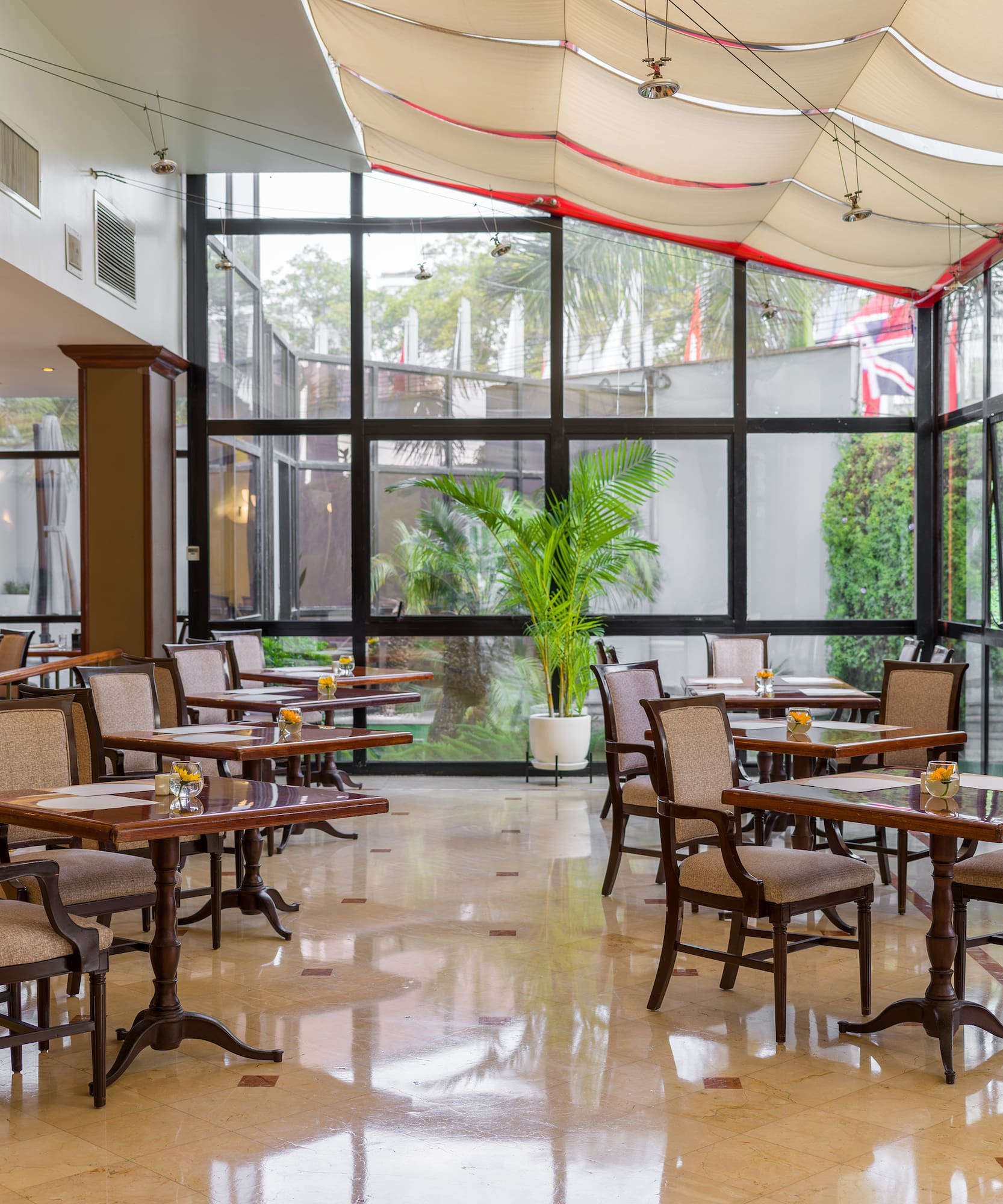 a room with tables and chairs