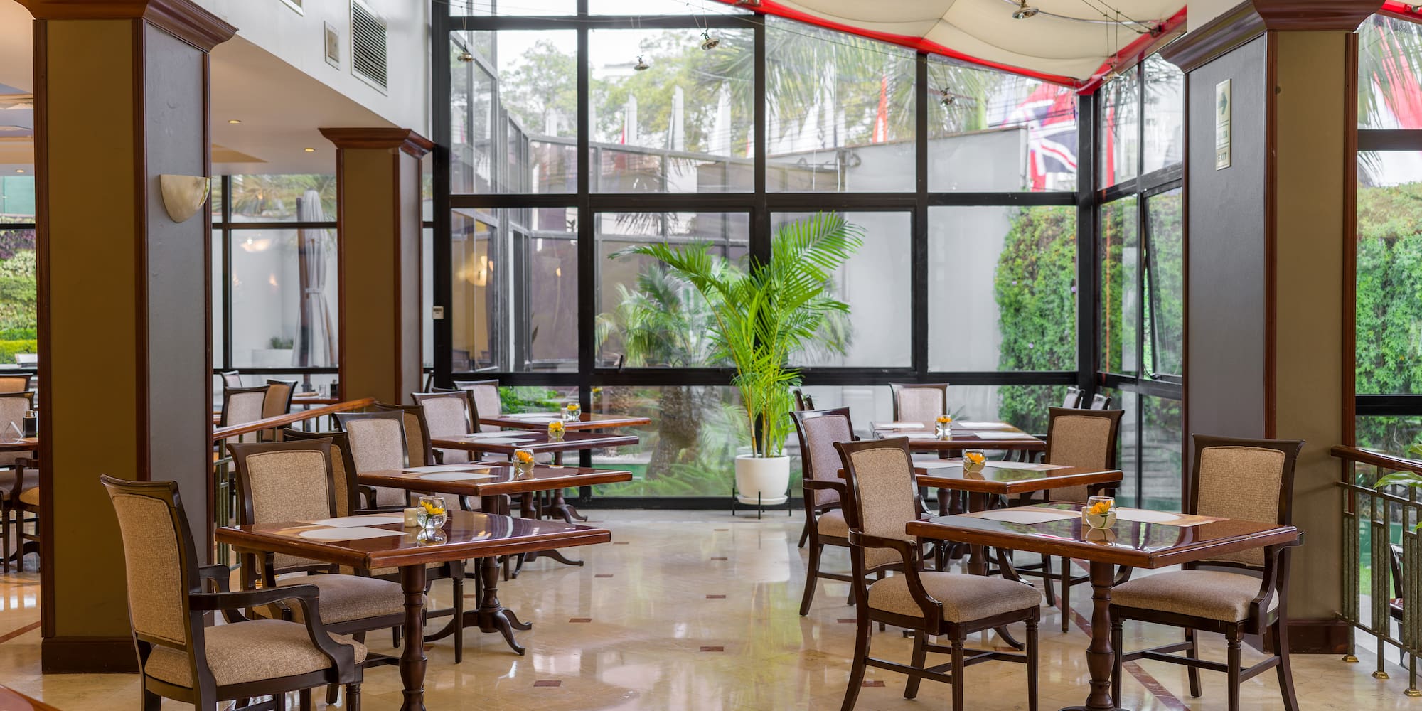 a room with tables and chairs