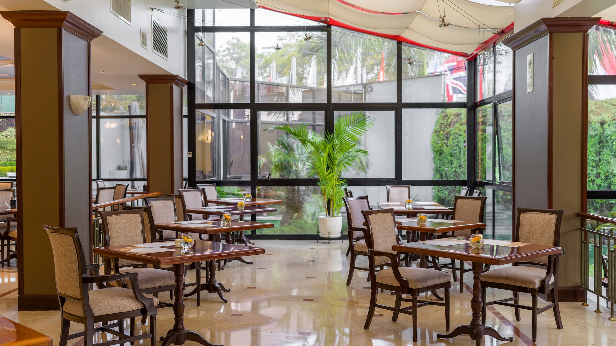 a room with tables and chairs