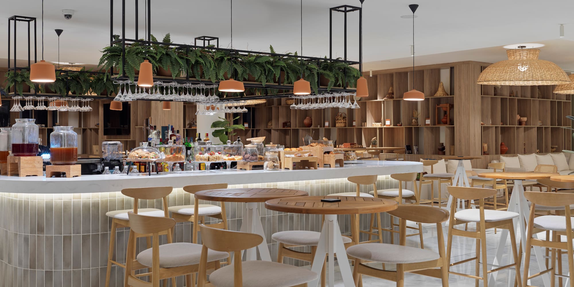 a restaurant with tables and chairs