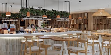 a restaurant with tables and chairs