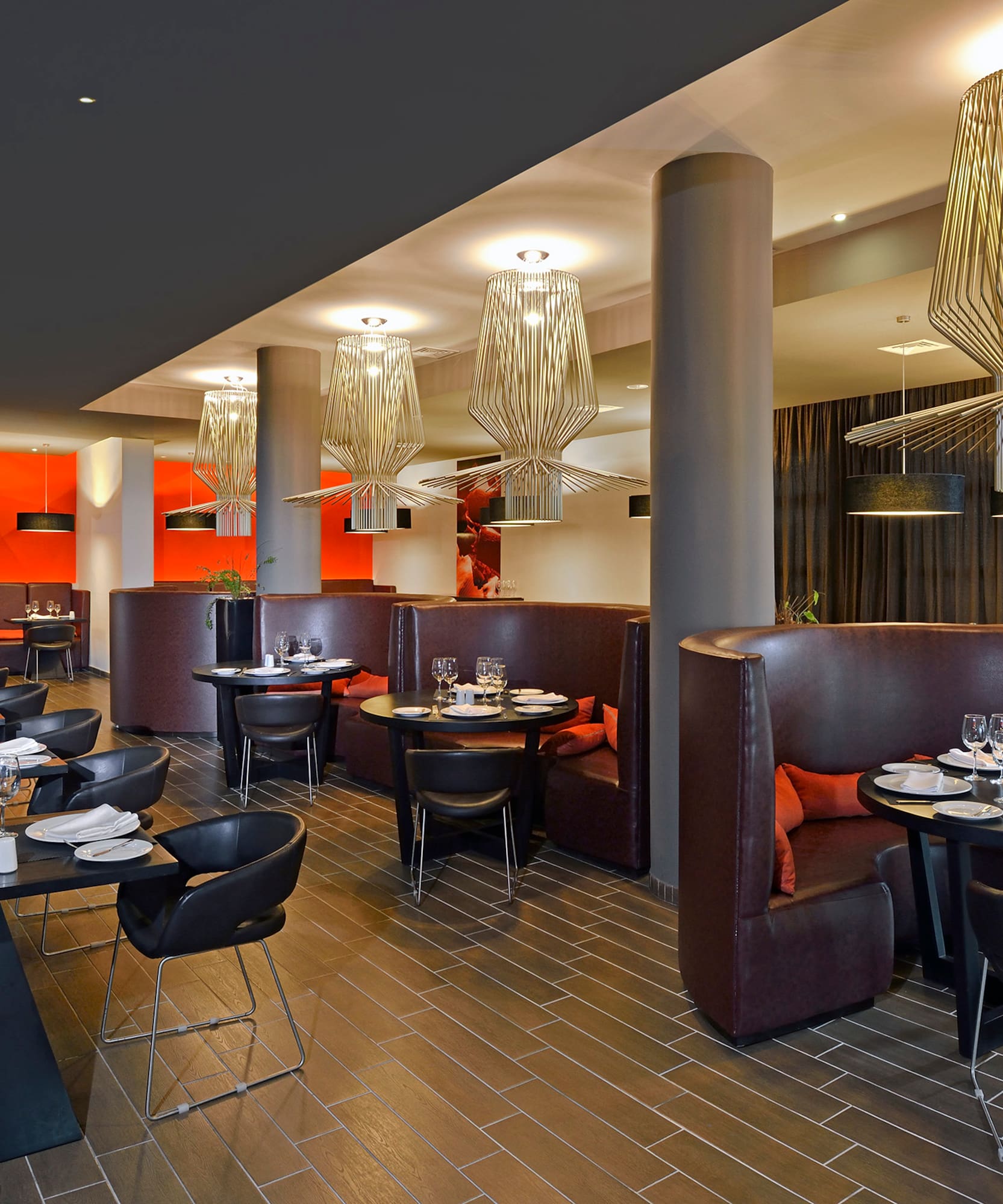 a restaurant with tables and chairs