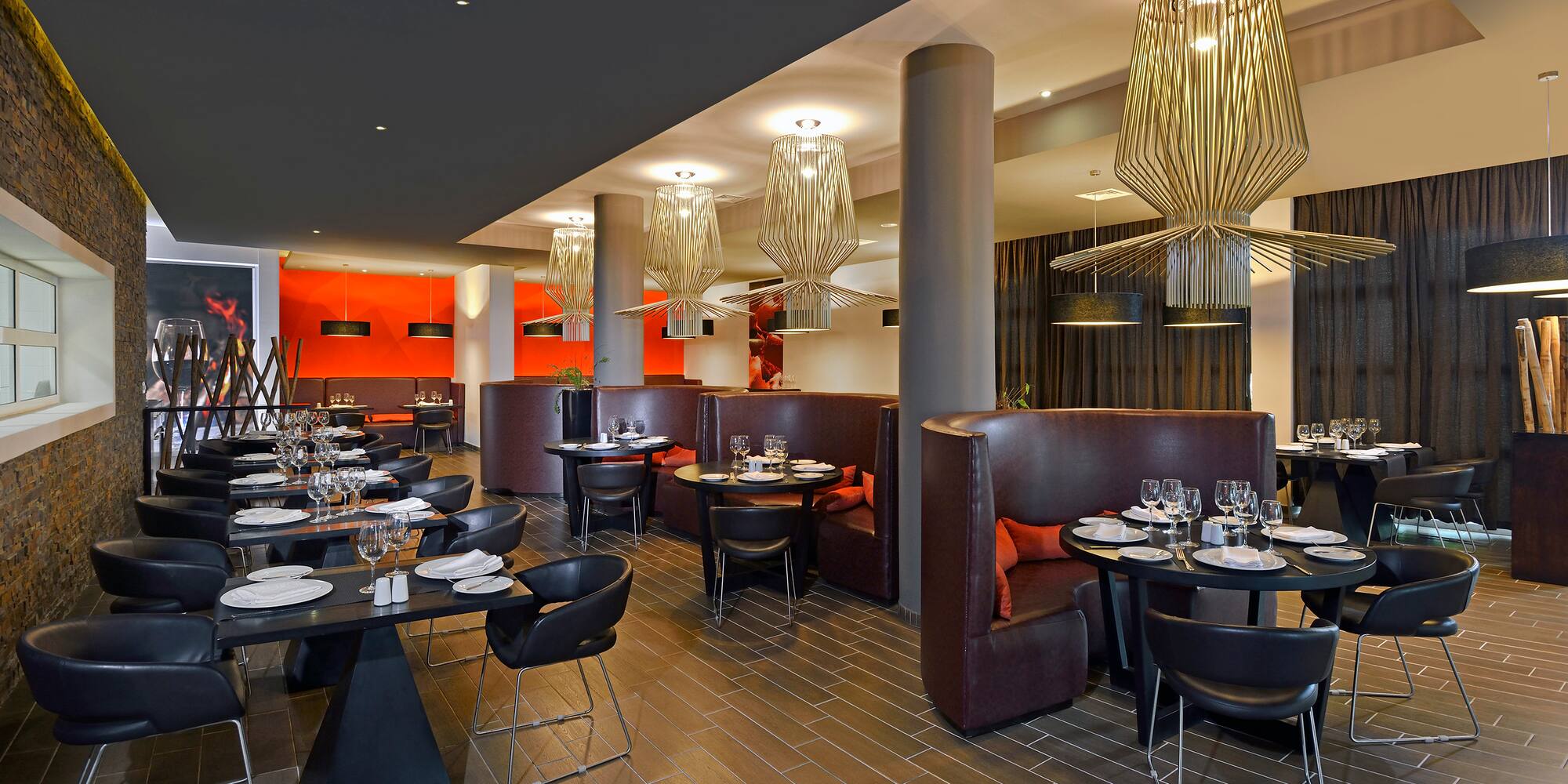 a restaurant with tables and chairs