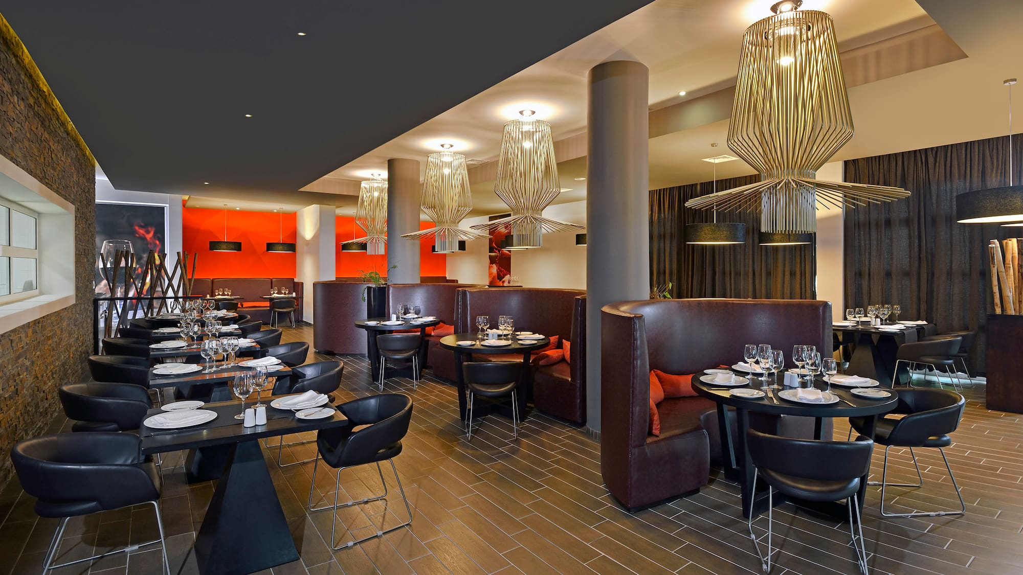 a restaurant with tables and chairs